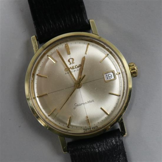 A gentlemans steel and gold plated Omega Seamaster automatic wrist watch.